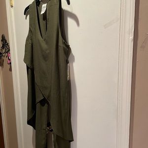 Fleur de Lis long vest. Sleeveless. Olive green. Size Medium.